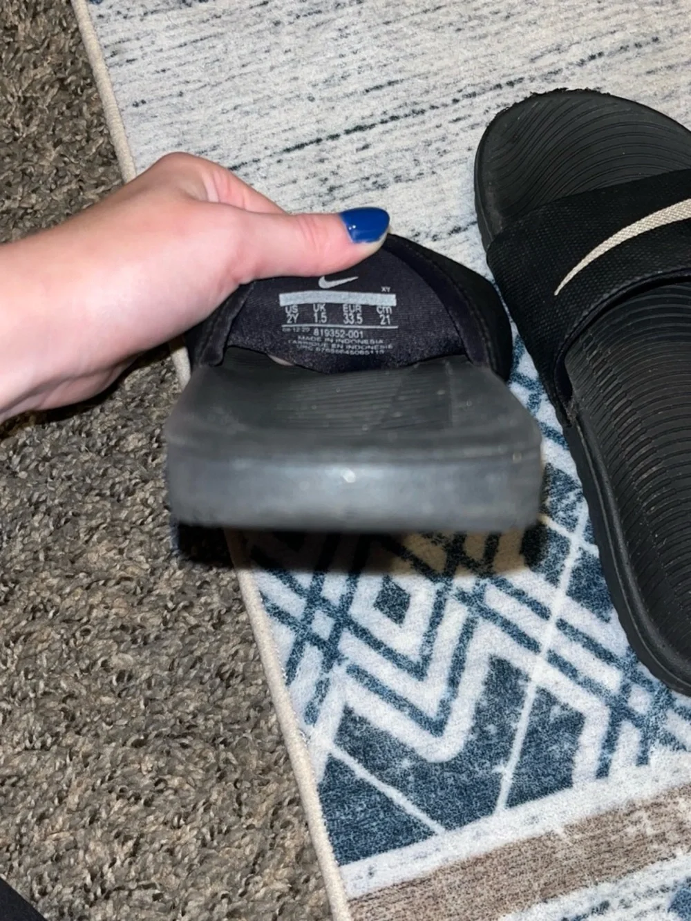 Nike Kids Black Slide Sandals with White Swoosh Accent
